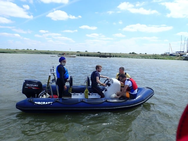 EYC Inflatable Rib being used as a safety boat with crew of three.